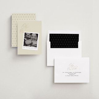 This is a linen foil stamped save the date cards with foil pressed by Lori Wemple called polaroid script printing on recycled smooth signature in standard
