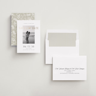 This is a noir foil stamped save the date cards with foil pressed by Jennifer Postorino called layered printing on recycled smooth signature in standard