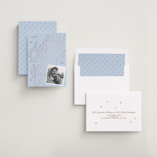 This is a milky way foil stamped save the date cards with foil pressed by Inkblot Design called swirl printing on recycled smooth signature in standard