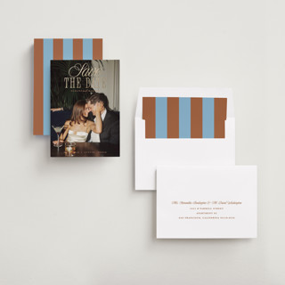 This is a camel foil stamped save the date cards with foil pressed by Maria Alou called his & hers printing on recycled smooth signature in standard