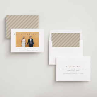 This is a porcelain foil stamped save the date cards with foil pressed by Stacy Maalouf called gilded simplicity printing on recycled smooth signature in standard