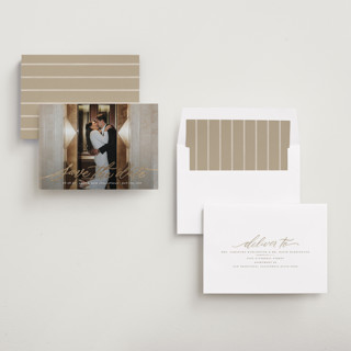 This is a chamomile foil stamped save the date cards with foil pressed by Wildfield Paper Co called daisy printing on recycled smooth signature in standard