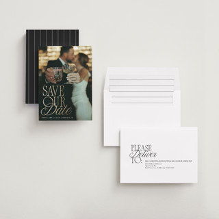 This is a pearl foil stamped save the date cards with foil pressed by Olivia Goree called celebration printing on recycled smooth signature in standard