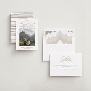 This is a chiffon foil stamped save the date cards with foil pressed by Heather Schertzer called mountaintop crest printing on recycled smooth signature in standard