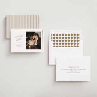This is a cloud foil stamped save the date cards with foil pressed by Ashlee Townsend called classic city printing on recycled smooth signature in standard
