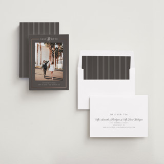 This is a graphite foil stamped save the date cards with foil pressed by Melanie Kosuge called mulholland printing on recycled smooth signature in standard
