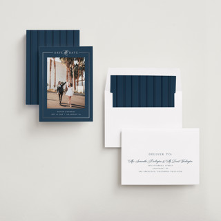 This is a navy foil stamped save the date cards with foil pressed by Melanie Kosuge called mulholland printing on recycled smooth signature in standard