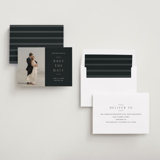 This is a charcoal foil stamped save the date cards with foil pressed by Stacey Meacham called subtle elegance printing on recycled smooth signature in standard