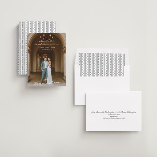 This is a ivory foil stamped save the date cards with foil pressed by Alethea and Ruth called celebration xo printing on recycled smooth signature in standard
