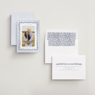 This is a periwinkle foil stamped save the date cards with foil pressed by Jenna Holcomb called antique greenery printing on recycled smooth signature in standard