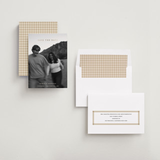 This is a buttercream foil stamped save the date cards with foil pressed by Carolyn Hunt called golden merry printing on recycled smooth signature in standard