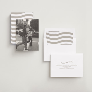 This is a greige foil stamped save the date cards with foil pressed by Inkblot Design called wavy printing on recycled smooth signature in standard