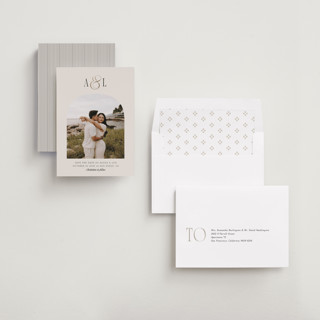 This is a cream foil stamped save the date cards with foil pressed by Robert and Stella called skye printing on recycled smooth signature in standard