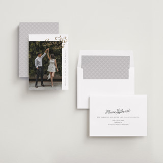This is a pearl foil stamped save the date cards with foil pressed by Chryssi Tsoupanarias called swirling printing on recycled smooth signature in standard