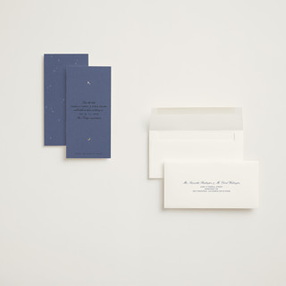 This is a twilight blue foil stamped save the date cards with foil pressed by Leia Matt called celeste printing on signature in tall