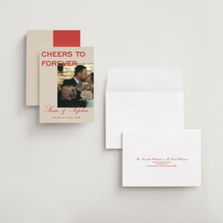 This is a tomato petite save the dates with standard by Sydney Kay called bold cheers printing on recycled smooth signature in petite