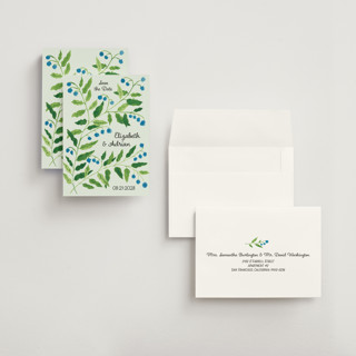 This is a mint petite save the dates with standard by Claire called lily of the valley printing on signature in petite