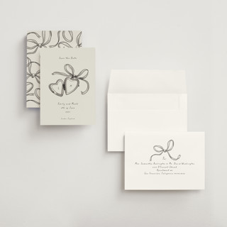 This is a ink wash petite save the dates with standard by Ani Somi called heart shaped locket printing on signature in petite