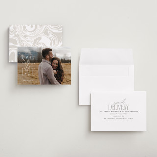 This is a cotton petite save the dates with standard by Owl and Toad called monument printing on recycled smooth signature in petite