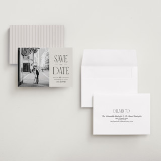 This is a dove petite save the dates with standard by Robert and Stella called pierre printing on recycled smooth signature in petite