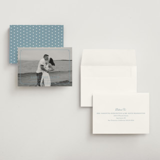 This is a french blue petite save the dates with standard by Carolyn MacLaren called fleur corner printing on recycled smooth signature in petite