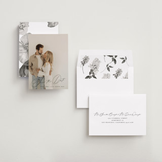 This is a inked save the date with standard by Design Lotus called symphony us printing on recycled smooth signature in standard