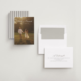 This is a ivory save the date with standard by Emily Betts called story printing on recycled smooth signature in standard