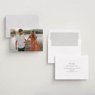 This is a snow save the date with standard by Angela Thompson called namesake printing on recycled smooth signature in standard