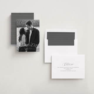 This is a snowfall save the date with standard by Lauren Chism called subtle rise printing on recycled smooth signature in standard