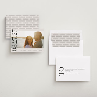 This is a ivory save the date with standard by Pixel and Hank called all stacked up printing on recycled smooth signature in standard