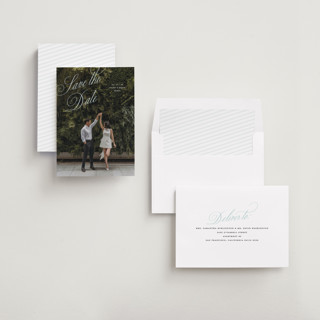 This is a skyline save the date with standard by Pixel and Hank called enamored printing on recycled smooth signature in standard