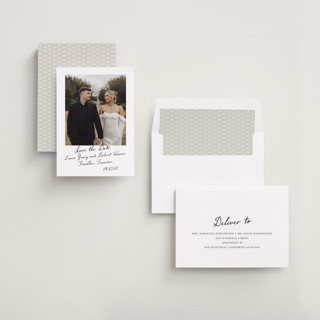 This is a snow save the date with standard by Sara Hicks Malone called vintage script printing on recycled smooth signature in standard