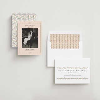 This is a blush save the date with standard by Susan Moyal called monogramed printing on recycled smooth signature in standard