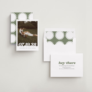 This is a pearl save the date with standard by Christie Garcia called sidele printing on recycled smooth signature in standard