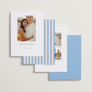 This is a dusty blue save the date with standard by Leah Ragain called outlined date printing on recycled smooth signature in standard