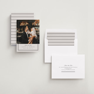 This is a linen save the date with standard by Nicole Walsh called shimmer printing on recycled smooth signature in standard