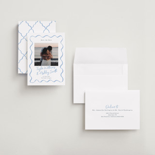 This is a dusty blue save the date with standard by Cass Loh called handdrawn wavy frame printing on recycled smooth signature in grand