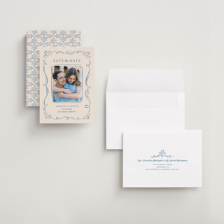 This is a dusty blue save the date with standard by Lucia Saisse called happy day printing on recycled smooth signature in grand