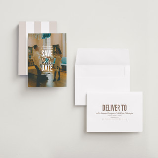 This is a lily save the date with standard by Owl and Toad called full page printing on recycled smooth signature in grand