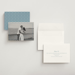 This is a french blue save the date with standard by Carolyn MacLaren called fleur corner printing on recycled smooth signature in grand