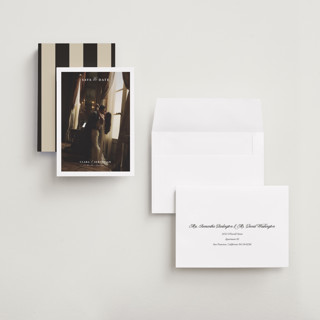 This is a snow save the date with standard by Lucrecia Caporale called simple amore printing on recycled smooth signature in grand