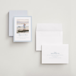 This is a dusty blue save the date with standard by Jennifer Postorino called coastal charm printing on recycled smooth signature in grand