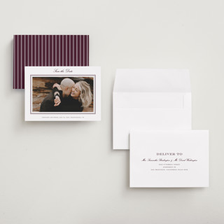 This is a burgundy save the date with standard by Stacey Meacham called engraved names printing on recycled smooth signature in grand