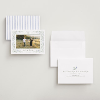 This is a periwinkle save the date with standard by Kristen Smith called delicate vines printing on recycled smooth signature in grand