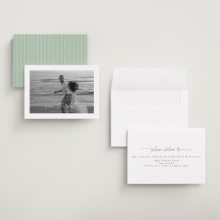 This is a ivory save the date with standard by Pippa Shaw called gaussian printing on recycled smooth signature in grand