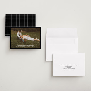 This is a coal save the date with standard by Becky Nimoy called black border printing on recycled smooth signature in grand