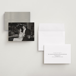 This is a ivory save the date with standard by Stephanie Heinrich Godbout called lovers printing on recycled smooth signature in grand