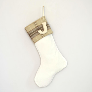 This is a beige holiday decorations by TwentyEight12 called personalized christmas stocking, velvet tan plaid in standard