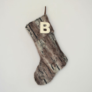 This is a brown holiday decorations by TwentyEight12 called personalized christmas stocking, brown faux fur in standard