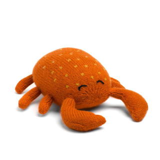 This is a orange accent pieces by Global Goods Partners called knit crab toy in standard